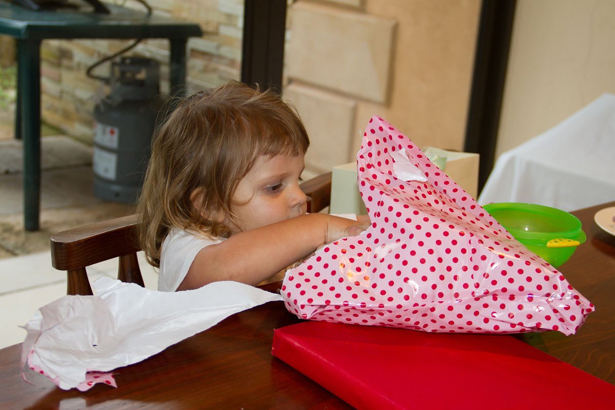 Emma opening her presents