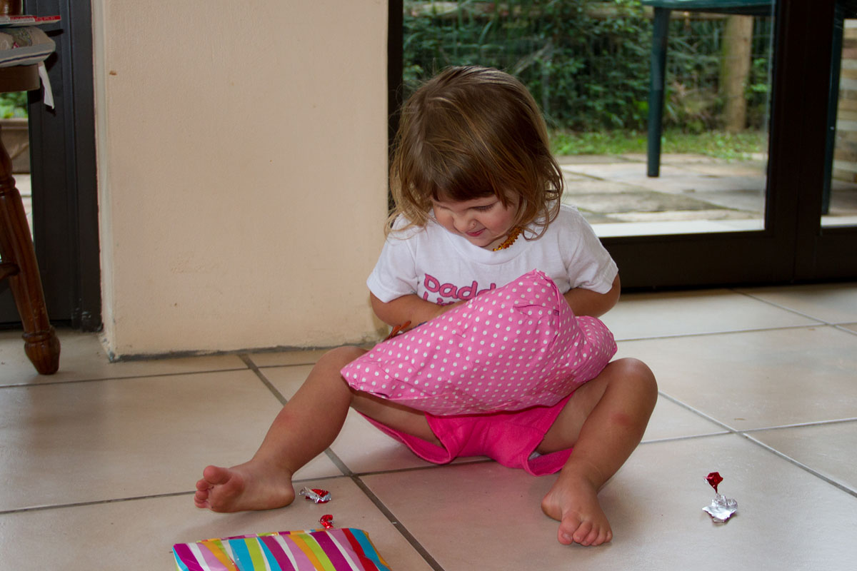 Emma opening her presents