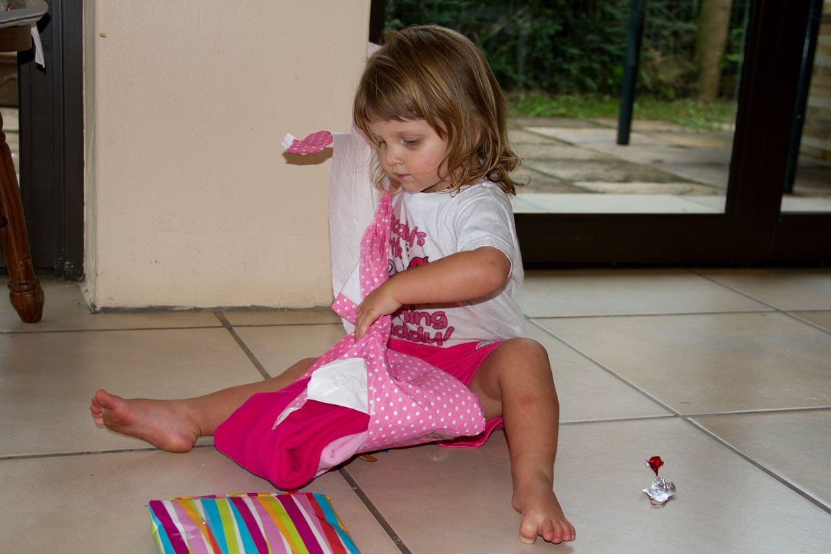 Emma opening her presents