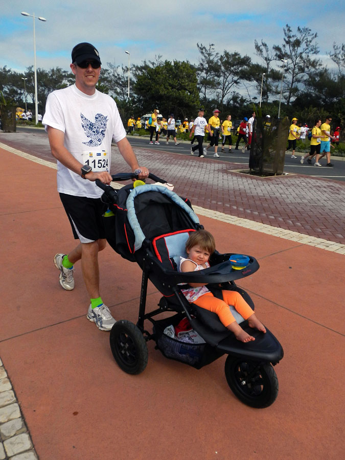 Pushing Emma on the ECR Big Walk